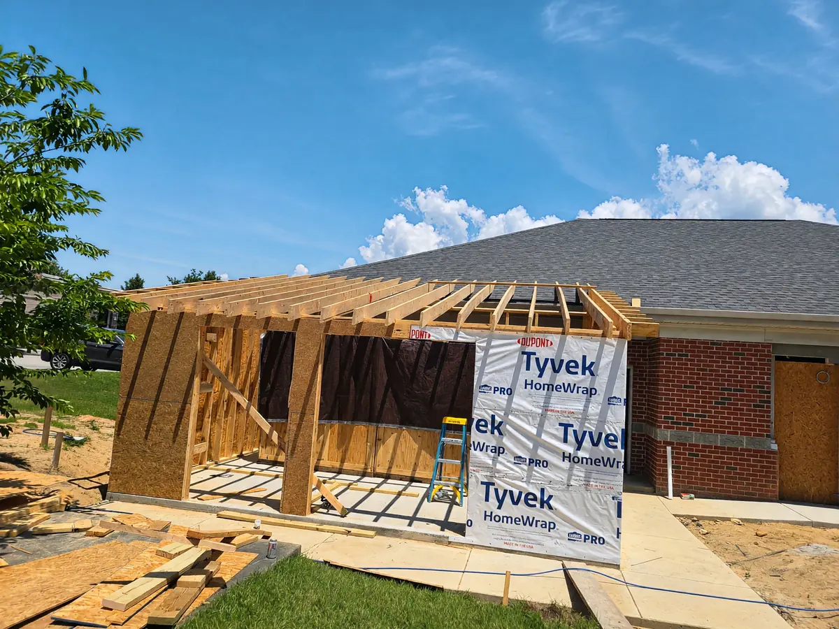 Addition framed and tied into an existing shingle roof